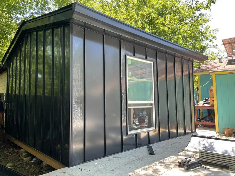 Black standing seam metal wall panels for Roof Inspection in Truckee
