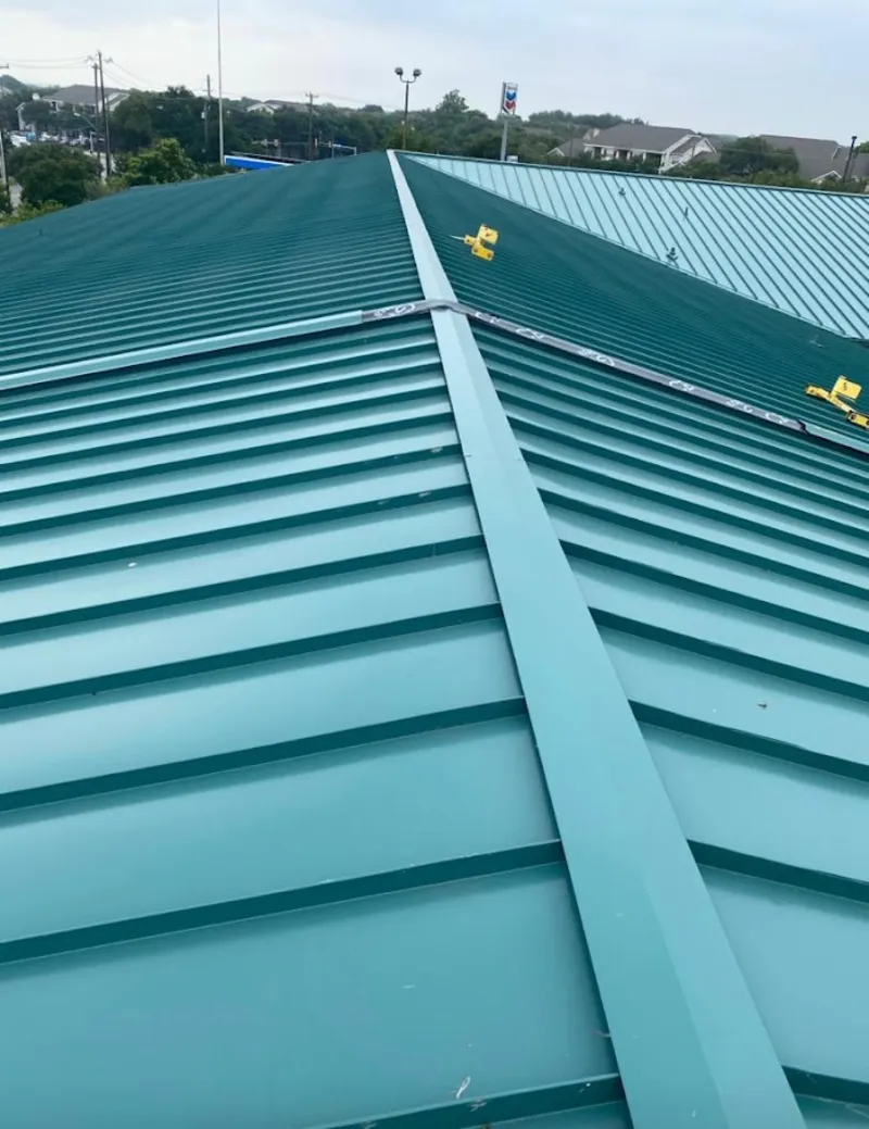 Green commercial metal roof ridge and valley for Metal Roof Repair in Truckee
